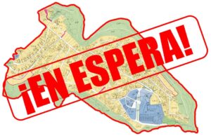 Mapa catastral de Planas del Rey con la inscripción “¡En espera!”, que simboliza el bloqueo administrativo del proyecto de reparcelación y la incertidumbre jurídica que impide su ejecución.